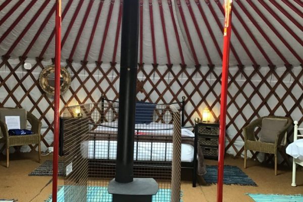 Caalm Camp red yurt interior